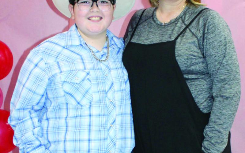 Holli Saporito joined her son Ryker Saporito for the recent elementary sweetheart dance held in the Central School Gym. Proceeds from the event will be used for Columbus High School After Prom.