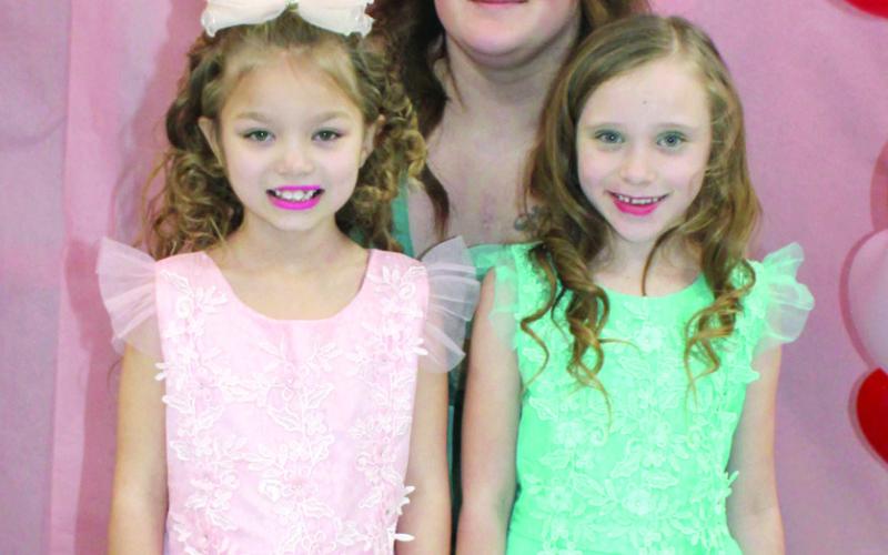 The recent elementary sweetheart dance gave families and friends of local students the opportunity to enjoy a night of music and fun. Nykia Boyd brought her daughter Addison Jones (pink dress) and her daughter’s friend Harlee Castagno (green dress) to enjoy the event. Proceeds from the event will be used for Columbus High School After Prom.