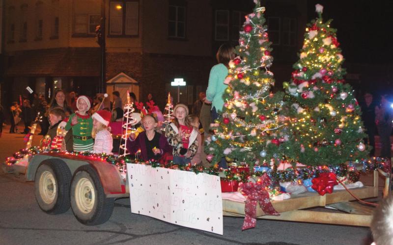 Spring Valley Sparklers 4-H Club entered their float in the Chamber of Commerce Christmas Parade. Creatively decorated trees were one of the highlights of their entry.