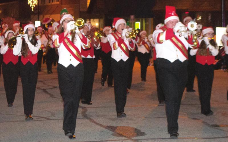 Members of the Columbus School district instrumental music departments performed a variety of holiday numbers during the Chamber of Commerce Christmas parade.
