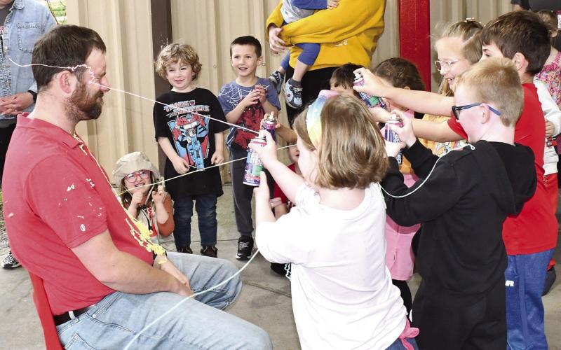 During Read Across America Week, Park Elementary students had a read-athon. Winners in each class were allowed to cover Principal Matthew Crain with silly string. Crain was sprayed once in the morning and once in the afternoon according to grade level and to include morning and afternoon Pre-K. News Report photo by Tanya Woolsey.