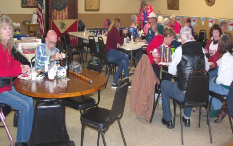 Members of the West Minerals Eagles Lodge enjoy taking time to eat with each other before an auction took place at their meeting earlier this month. A potluck dinner was available for all attendees to enjoy before a meaningful auction took place later that afternoon. Photo by Jacob Spencer