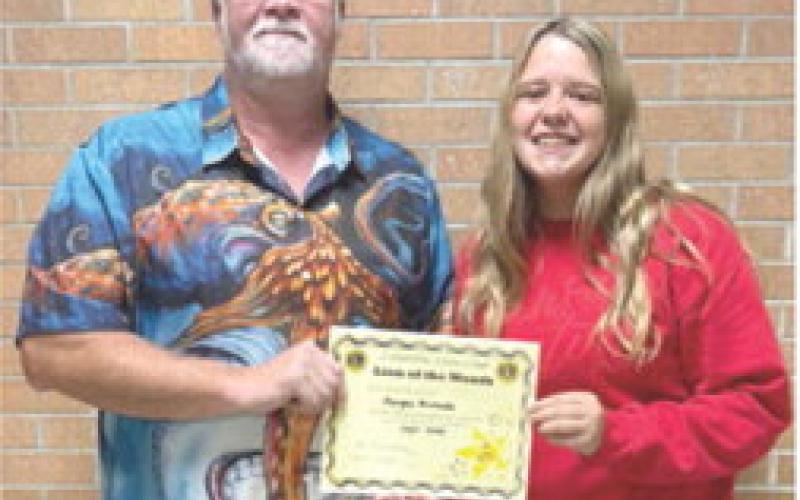 September Lion of the Month was presented to Morgan Richards by Lion Buddy Derfelt. Morgan is active in Band, Jazz Band, Volleyball, Softball, Student Council, Leo Club, Pep Club, Math Team, FCCLA, and Chick-fil-a Leadership Academy. Courtesy photo.