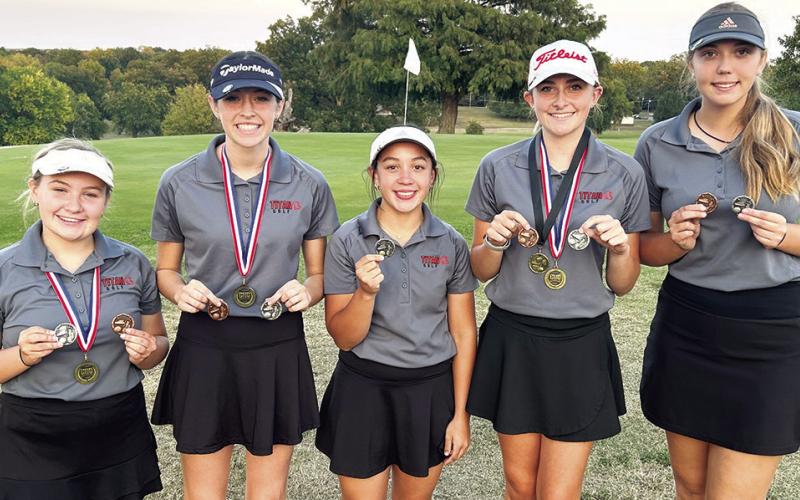 The Columbus Lady Titan Golf Team concluded their regular and CNC League season, Tuesday, at the Baxter Springs Varsity Golf Tournament. Sophomore, Natalie Wary, led the CUHS Team shooting a score of 90 to tie for third place. Columbus placed second behind St. Mary’s-Colgan in the tournament and in the final CNC League standings. Team members are Amory Neely, sophomore; Natalie Wary, sophomore; Hannah Noel, sophomore; Mallory Thompson, senior; and Anna Head, senior. Courtesy photo.
