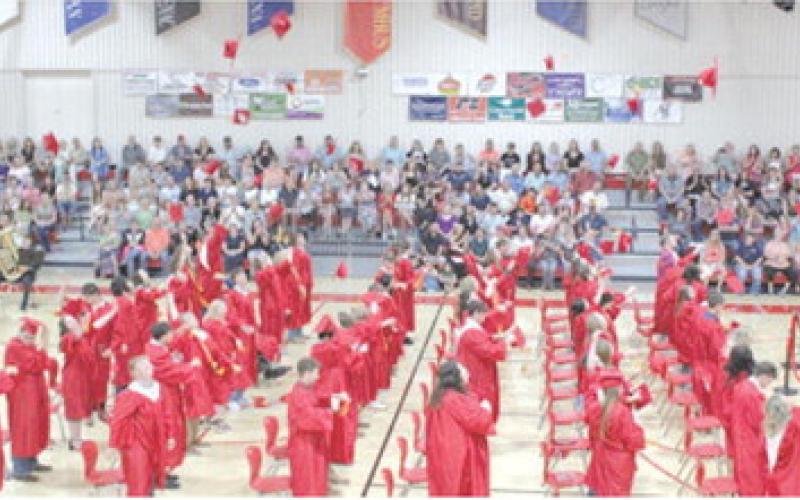 Columbus USD 493 graduates threw their caps in the air in instant celebration of the completion of the graduation ceremonies on Saturday.