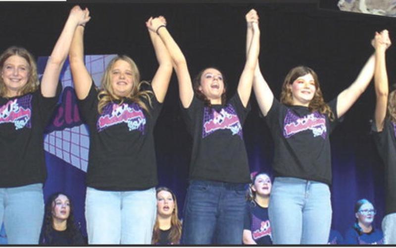Senior Jazz Band Members take a bow at the end of the 80’s What a Feeling show. Ava Hulvey Trinity Green, Morgan Richards, Piper Hayes, Katelyn Draeger, Darcy Garrett, and Natalie Edmondson. Not pictured Mackenzie Richards,