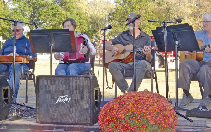Aunt Bea and Friends band entertained at the Scammon Annual Fall Festival. The band has been part of several festivals in the area and are always popular with their string instruments.