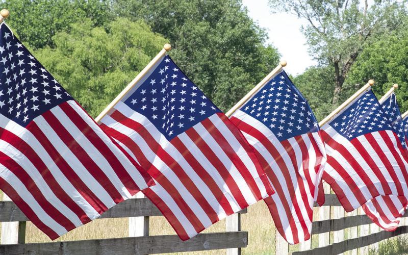 More than 50 flags decorate a fence in Cherokee County in recognition of Memorial Day. A time to remember those who gave their lives for America.
