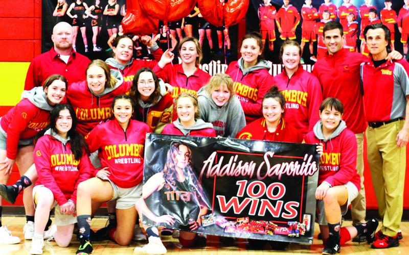 Lady Titan Senior, Addison Saporito, earned her 100th career win, Tuesday night, in a home dual win over Independence at the Columbus Unified High School Gymnasium. Addison celebrated with her team and coaches following the 54-18 win sweep over the Lady Bulldogs.