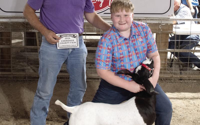 The Grand Champion Market Goat brought in a $1,600 premium during the Cherokee County Livestock Auction. Easton Haywood, Lone Elm Beavers 4-H club is the owner of the goat. The premium was paid by Columbus Veterinary Clinic, represented by Dr. Kurtis Gregory.