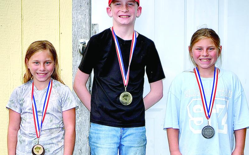 In the ages seven-10 division of the West Mineral Eagles fishing tournament, bass winners included Lincoln Overman, first, 5.03 pounds. Mattie Godfrey, second, 4.32 pounds and Mia Godfrey, 3.59 pounds. Courtesy photo.