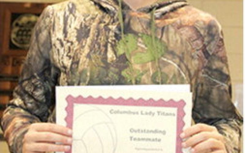 Lady Titan Senior, Adalie Grafel, received the award for Outstanding Teammate during the Lady Titan Volleyball end of season banquet at the Columbus Unified High School Gymnasium in October.