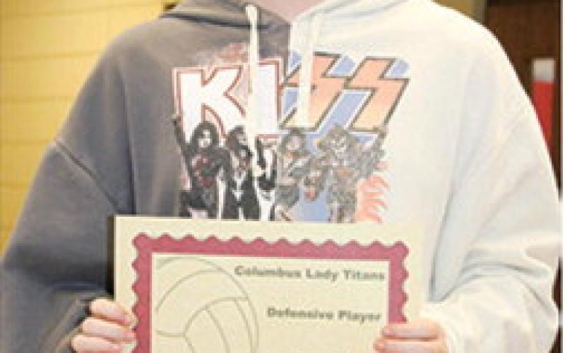 Lady Titan Junior, Kennedy Reichardt, received the Defensive Player Award, the Outstanding Passer Award and Outstanding Teammate Award during the Lady Titan Volleyball end of season banquet at the Columbus Unified High School Gymnasium in October.