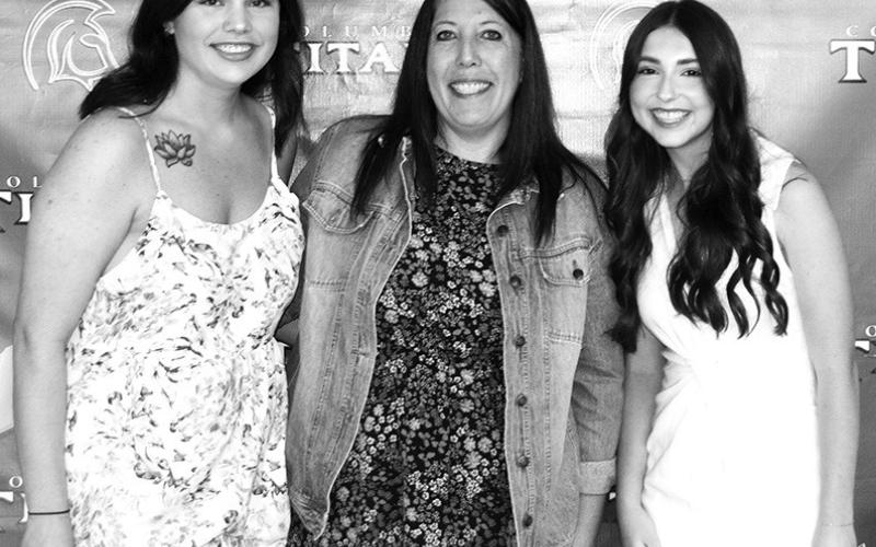 Columbus Unified High School Seniors Gabryelle Smith and Presley Tedlock each received a $250 Difference Maker Scholarship presented by Kerri Matson, in memory of her late husband Jonathan, May 17 at the CUHS Senior Awards Ceremony at the high school gymnasium.