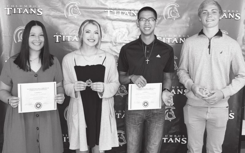 Columbus High School Seniors, Paige Zahm (Kansas Scholar Curriculum); Evie Parsons (CNC Academic All League); Andrew Coberley (Kansas Scholar Curriculum and CNC Academic All League); and Sylas Stone (CNC Acacemic All League) received recognition at the CUHS Senior Awards Assembly at the high school gymnasium in May.