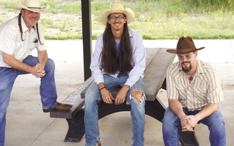 Columbus grad plays lead guitar Thursday