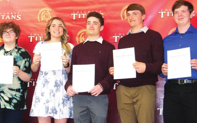 CUHS’s National Honor Society inducted nine new members into their organization on March 30. (Left to right) Chesney Dobkins, Madison Richards, Kate Holsnger, Ava Harman, Luke Gray, Landin Midgett, Nathan Stice, Bethany Johnson and Addison Saporito hold up their awards after being inducted together. Photo by Jacob Spencer.