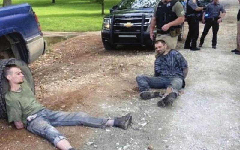 Two escapees from the Cherokee County Law Enforcement Center were captured south of Wyandotte by Ottawa County Sheriff officers on Friday. Mark Gerald Hopkins, II and Michael Martsolf escaped on Monday and were back in Cherokee County by the following Monday. Courtesy photo.
