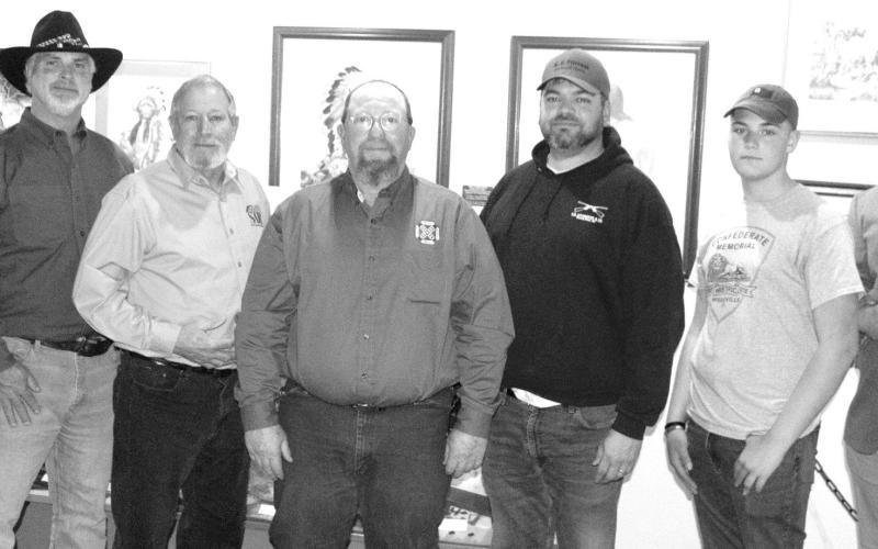 Members of the Sons of Confederate Veterans Pvt. Riley Crawford Camp meeting in Baxter Springs include Adjutant-Private Cole Hagebusch, 1st Lt. Commander Randy Barnett, Chaplain Rick Parmele and Commander Michael Freund. Adjutant Major Wes Franklin of the Thomas R. Livingston Camp, Keogan Franklin and Reese Barnett.