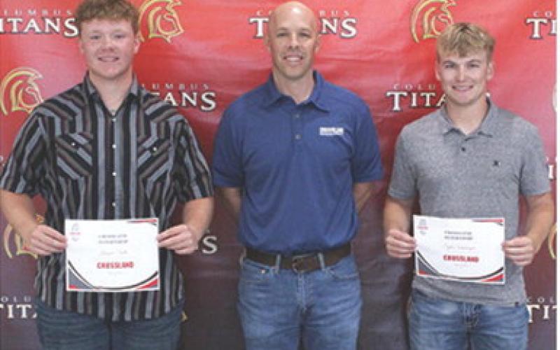Kanyen Smith and Syler Schuberger each received an Internship Offer from Crossland Construction from Crossland Representative, Travis Sills during the 2025 Senior Assembly at the Columbus Unified High School Gymnasium, May 16.