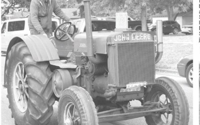 In addition to driving his antique tractor in the Columbus Day Parade, Harold Depenbush is also one of the organizers of the Farm Heritage Show that will be held on East Pine.