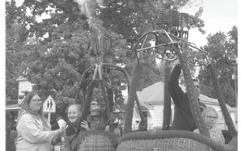 The Columbus Day Parade will begin at 9:40 a.m. Saturday. Balloonists often show off their propane flames during the route. Chase crews often ride with the pilots during the parade.