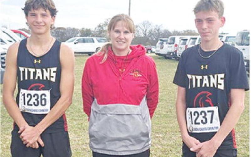 Titan Sophomores, Drake Laurance and Carter Woodcock competed at the Kansas Class 3A Cross Country Meet, Saturday in Lawrence at the Rim Rock Ranch Course. They were escorted to the meet by Head Coach Amanda Strickland. Courtesy photo.