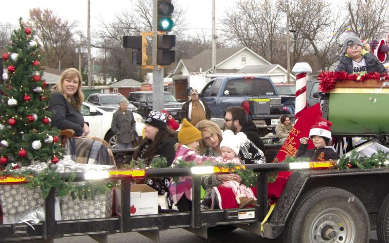 American Bank employees and their family members rode on this float during the Baxter Springs Christmas parade December 2.
