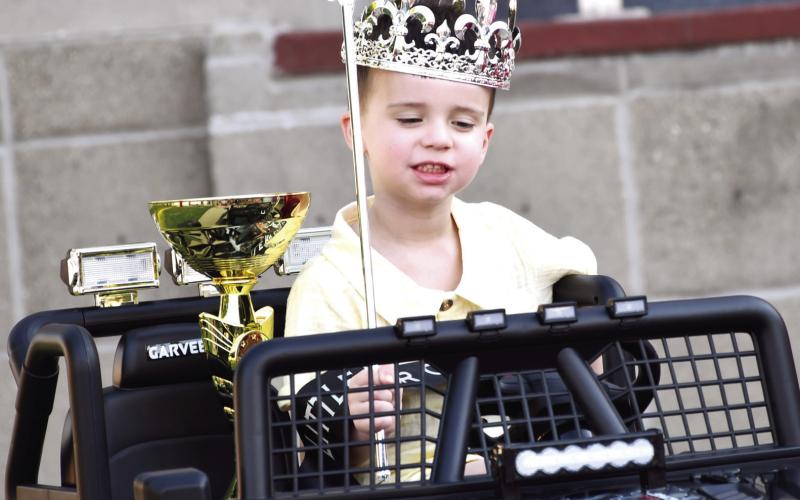 The Annual Little Mr. and Miss Columbus contest brought top awards to KayDee Richardson (above) and Kohen Robinson (below) who each won a motorized jeep in addition to their crowns, trophies and goodie bags. Across all candidates, more than $8,000 was raised for next year’s Columbus Day entertainment.