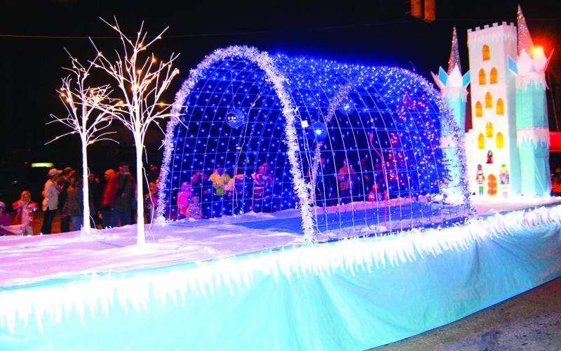 Farmers Coop placed first in the business float category for their entry in the Columbus Christmas parade.