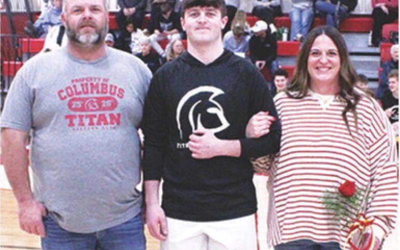 Titan Senior, Jett Tanner, was recognized during Senior Night at the Titans final home game against Frontenac, Monday night at the CUHS Gymnasium. Jett is a four-year member of the Titan Basketball Team. He was escorted by his parents Jerad and Ashley Tanner.