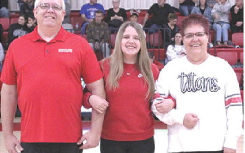 Lady Titan Senior, Morgan Richards, was recognized during Senior Night at the Titans final home game against Frontenac, Monday night at the CUHS Gymnasium. Morgan has been a manager for the Lady Titan Basketball Team for two years. She was escorted by her parents Drew and Kim Richards.