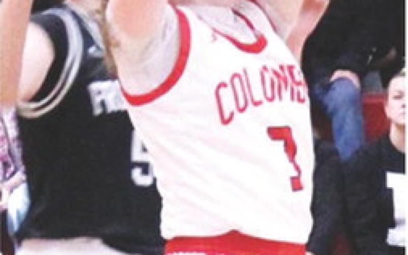 Lady Titan Senior, Katelyn Draeger, came down with a defensive rebound in the, 63-23, Columbus loss to Frontneac in the regular season finale, Monday, at the Columbus Unified High School Gymnasium.