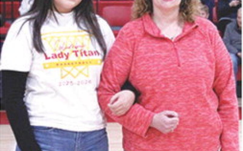 Lady Titan Senior, Alexandra Quisbert, was recognized during Senior Night at the Titans final home game against Frontenac, Monday night at the CUHS Gymnasium. Alexandra is a foreign exchange student and a member of the Lady Titan Basketball Team of one year. She was escorted by her host mother, Alicia Hayes.
