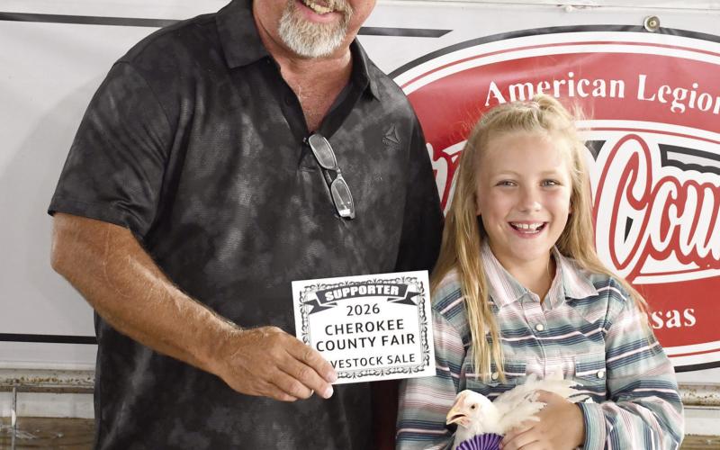 Stetson Danley’s Grand Champion chicken brought in a $650 premium from Puddle Jumpers Liquor Store represented by Rodney Oels.