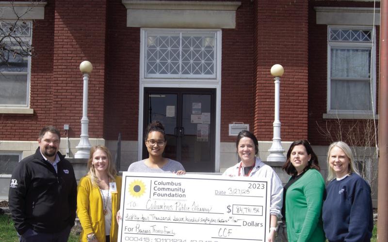 Columbus Public Library received a memorial donation from former Columbus resident Barbara Lee Thomas. Those attending the check presentation included Matt Case, Angie Saporito, Library Lauren Chesner Dainty, Kelly Walters, Jennifer Thompson, Janet Graham. Inset: Barbara Thomas.
