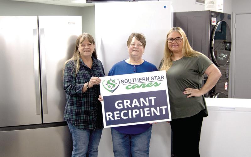 Representatives with the Hope Chest in Baxter Springs traveled to Westco in Columbus to pick up appliances purchased with a grant from Southern Star Pipeline. Barbara Bilke, Robin Byrd and Hope Chest coordinator Becky Ernst made the trip. Columbus News Report photo by Tanya Woolsey.