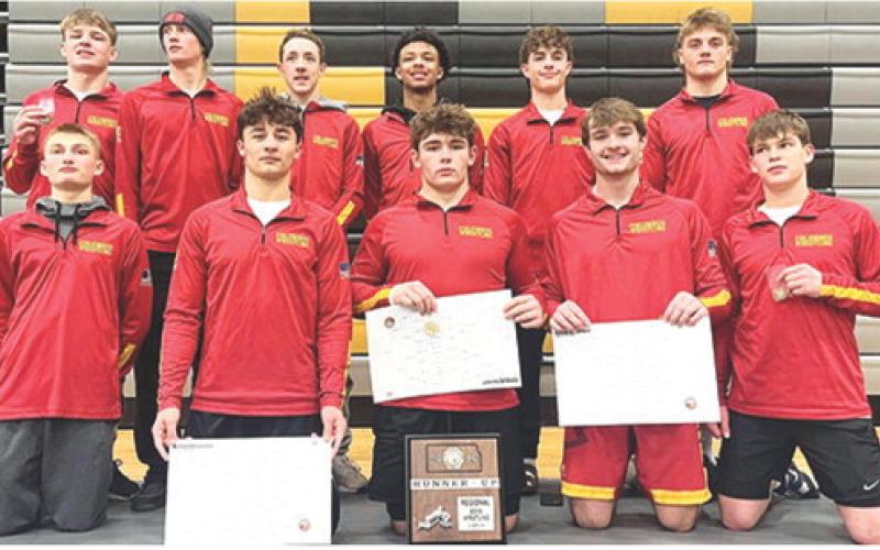 The Columbus Titan Wrestling Team captured the Kansas Class 4A Regional C Runner-up plaque in Paola, Saturday. Three Titans came away with regional champion titles and three placed third to advance to the state tournament. Members of the regional runner-up team are front row: Carlson Britt, Jayden Rodriguez, Kash Smith, Mason O’Banion, and Shade Schuberger. Back row: Chase Pelt, Cal Saporito, Denver Hughes, Kai Langerot, Wyatt Pool, and Braun Stone. Courtesy photo.