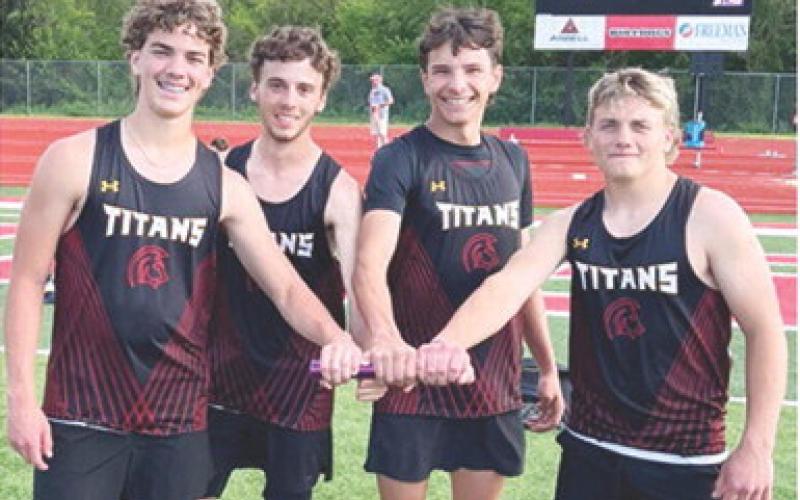 The Titan 4x200 Meter Relay helped add a new mark to the Columbus Unified High School Record Books with their fourth place finish in the Carl Junction, Mo. Track and Field Meet, Friday. Cole Howard, Levi Simpson, Drake Laurance, and Braun Stone added their names to the history of CUHS Track and Field as the first to post a time in the event. Courtesy photo.