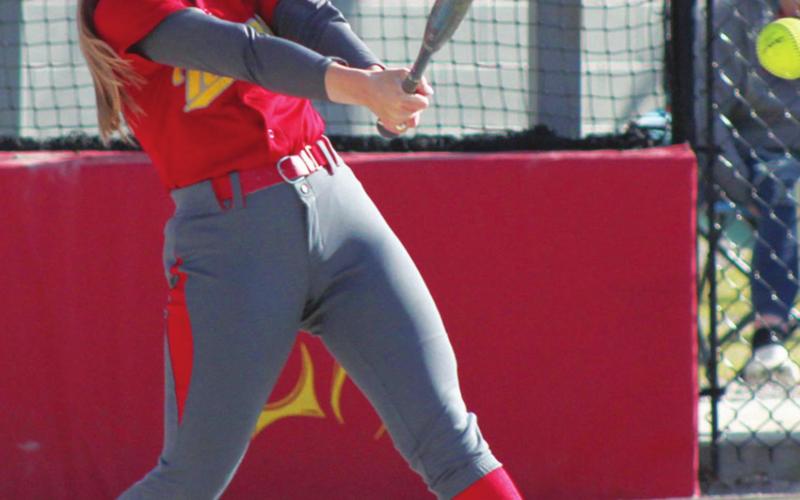 Lady Titans tame Purple Dragons