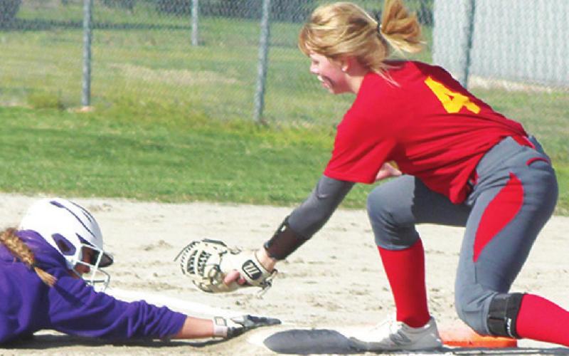 Lady Titans tame Purple Dragons