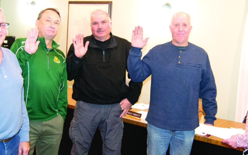 Re-elected council members were sworn in Tuesday evening during the Baxter Springs City Council meeting including Rick Chriestensen, Jody Bingham, Jimmy Younger Mayor Kelly Abbott are being sworn in by City Clerk Sharon Clark.