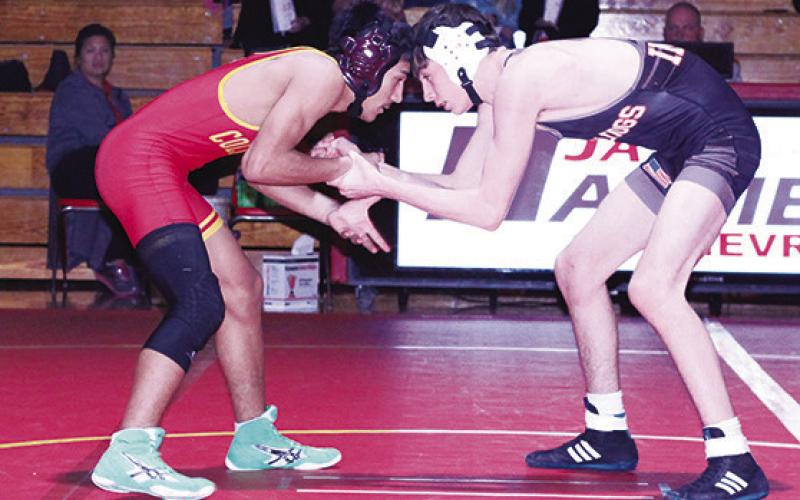 Southeast Lancer Sophomore, Langstyn Arther-Soliven, wrestles with the Columbus Titans during regular season matches. Arther-Soliven placed third at the Kansas Class 3A Regional and will represent Southeast at the state tournament Friday and Saturday at Fort Hays State University.