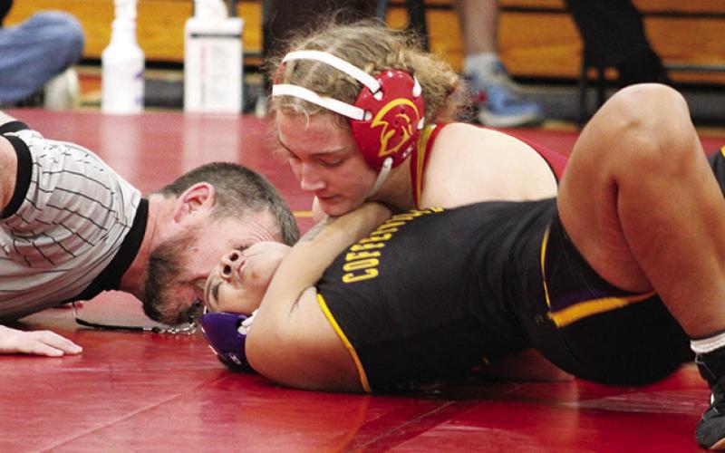 Lady Titans host five-team duals