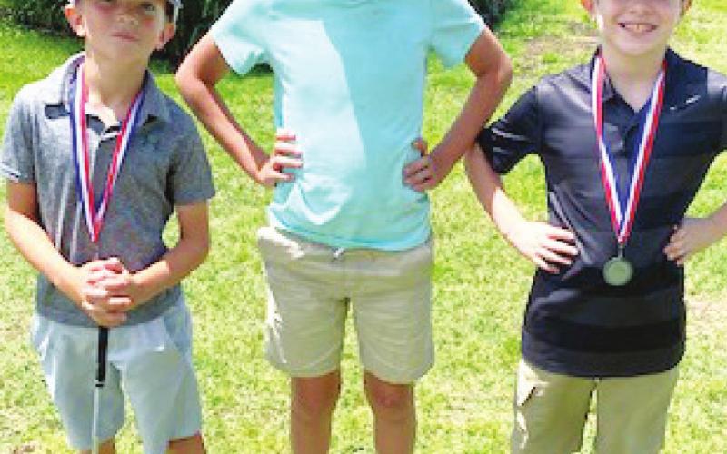 Jase Mooney, Cooper Grundy, and Jacob Wary represented the Columbus Junior Golf Program at the Oswego Junior Golf Tournament, June 2 in Oswego. Jase placed fourth in the 9-10 age group and Jacob placed second. Cooper played in the 11-12 division. Courtesy Photo.
