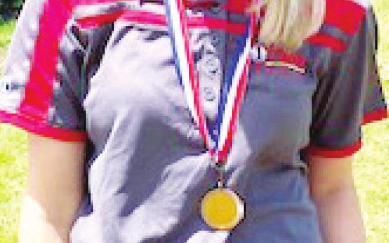 Evelyn Smith finished third in the girl’s 7-8 age group at the Oswego Junior Golf Tournament, June 2 in Oswego. Brother, Kash Smith, placed second in the boy’s 11-12 age group for the Columbus Junior Golf Team. Lady Titan, Reese Grundy placed second in the girl’s high school division. Courtesy Photo.