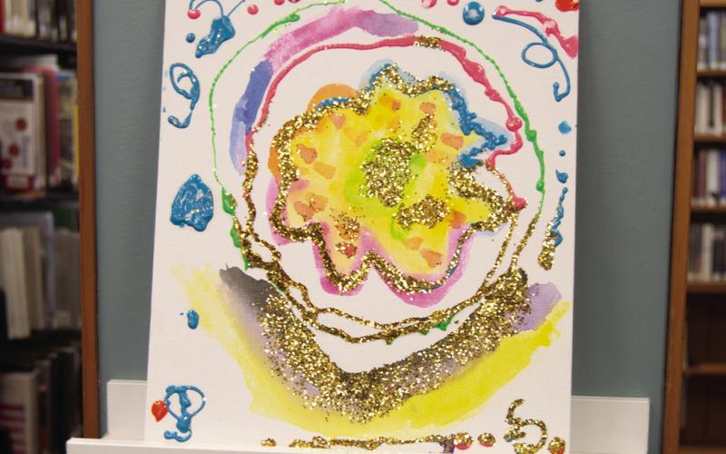 Morgan Moser, Kindergarten, created this colorful swirled piece including glittery portions. Her art piece was on display at the Columbus Public Library.