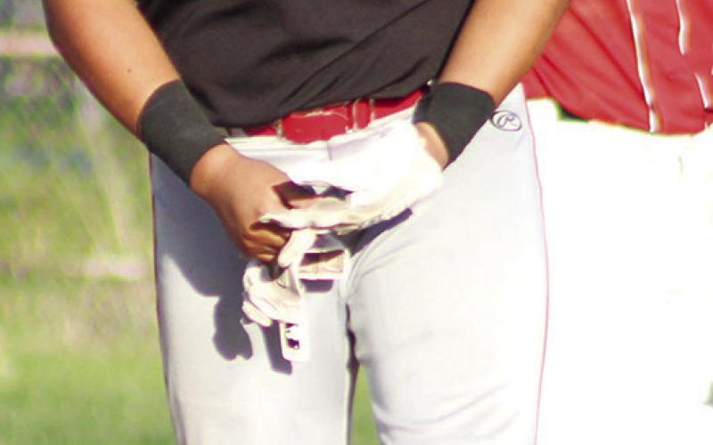 Rece Ponce, Titan Senior, stands at second on one of his three doubles recorded in the, 12-7, comefrom- behind win over Labette County, Tuesday, at the Community Field Ball Park. Ponce had three doubles and a single to collect five Runs-Batted-In for Columbus in the win.