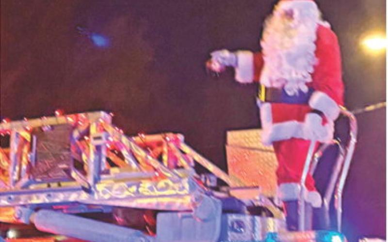 Santa made a special stop in Columbus during the Christmas parade Wednesday night. He was the grand finale of the night’s festivities as he rode through town on the Columbus Fire Department truck.