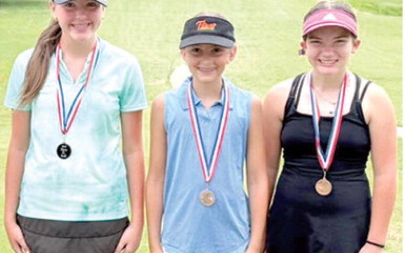 Cami Carpino, placed second; Olivia Dainty, third; and Alaina Smiley, fourth in the girls 12-14 age division of the Columbus Junior Golf Invitational Tournament, June 4 at the Brush Creek Golf Course. The girls are members of the Columbus Junior Golf Program. Courtesy photo.